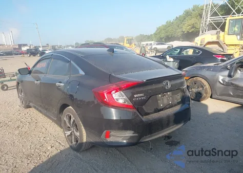 2017 Honda Civic Touring z USA, uszkodzony, nr VIN 19XFC1F95HE010135